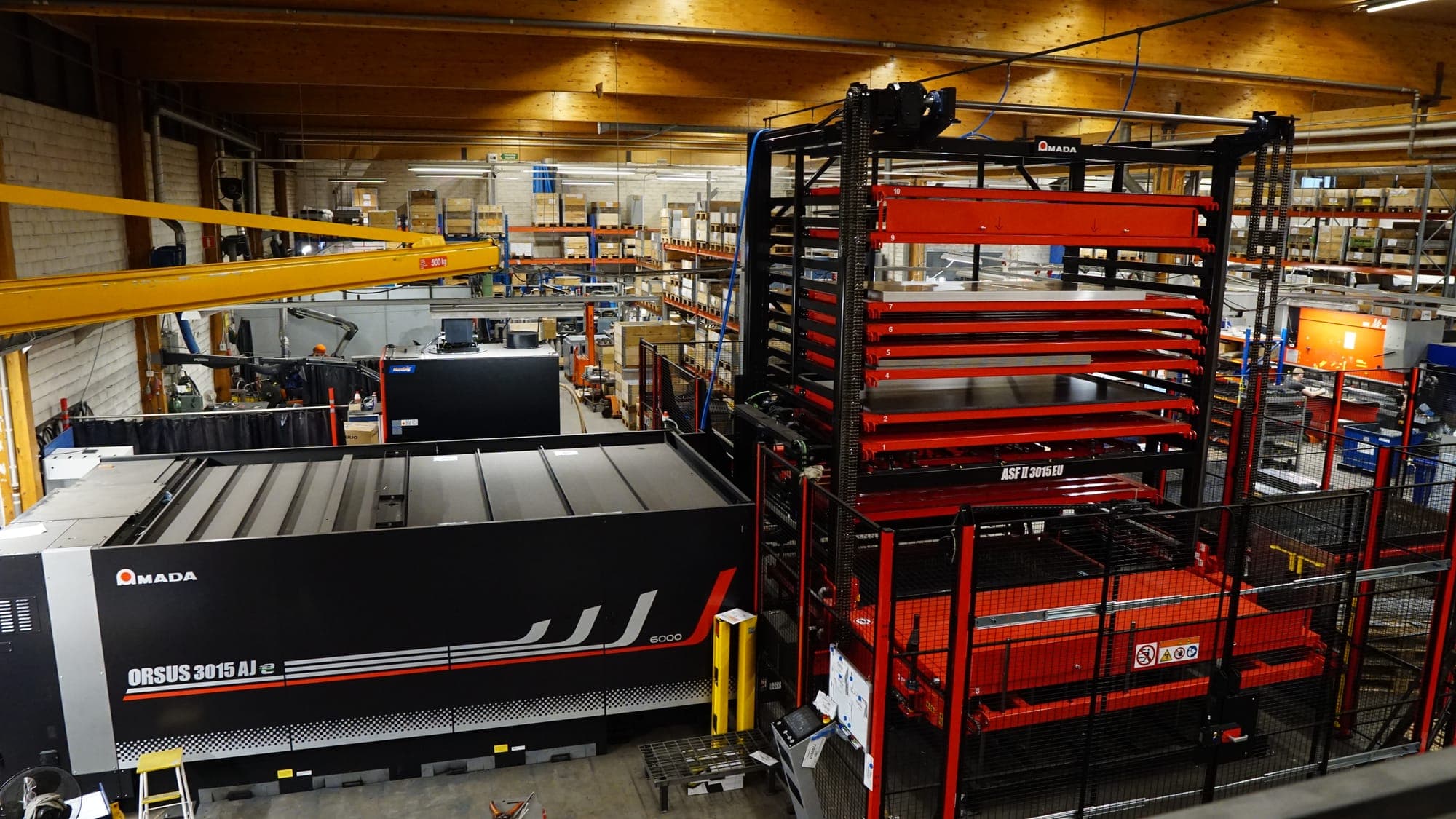Amada ORSUS 3015 AJe fibre laser and ASF II 3015 EU sheet storage tower in the production hall